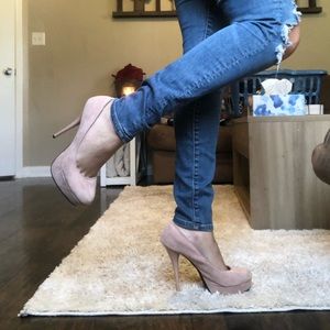 Pink suede high heel shoes